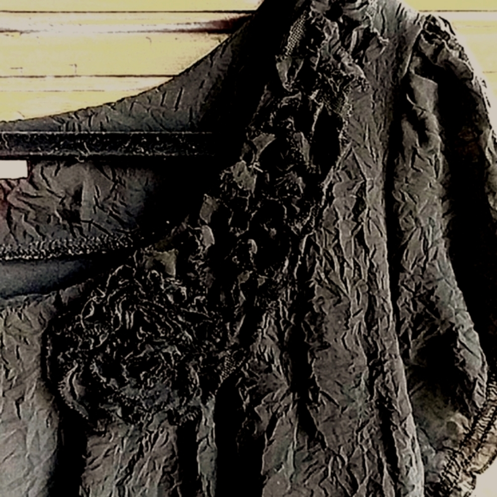 Sunny Leigh boho top with rosette detailing. Large